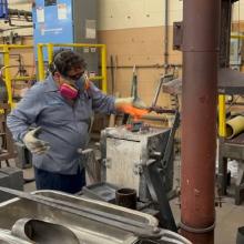 Mid-States employee refines metal
